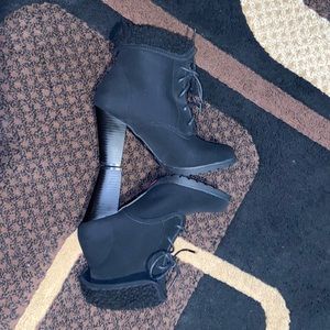 Brand new black heeled booties from White Mt.